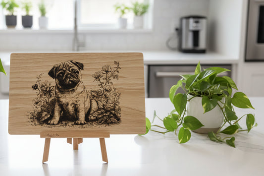 Wooden plaque with a engraved pug design on a white background