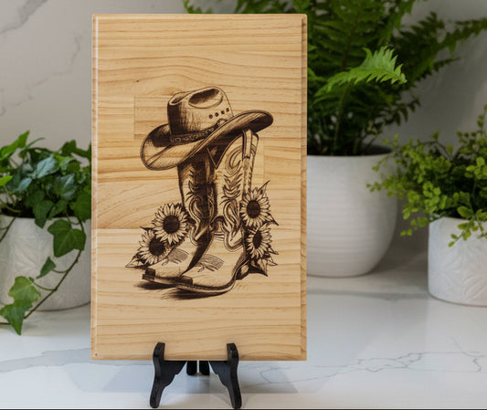 Wooden tray with cowboy hat and sunflower design on a gray background